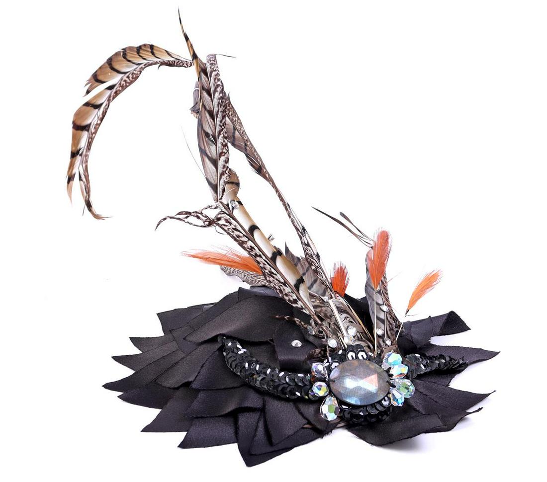 Feather hat (brown). Accessory from celebrAGE: Feather hat (brown). Accessory from celebrAGE (2011), a co-production of choreographers Adriaan Luteijn and Gisela Rocha and photographer and filmmaker Erwin Olaf. Designer Fernando Silva