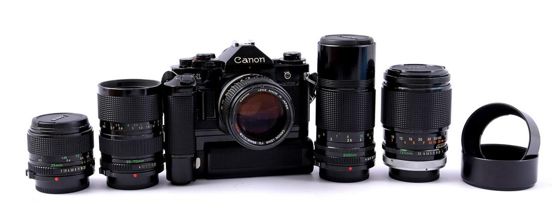 Canon A1 single lens camera with five lenses and motor (1 of 2)