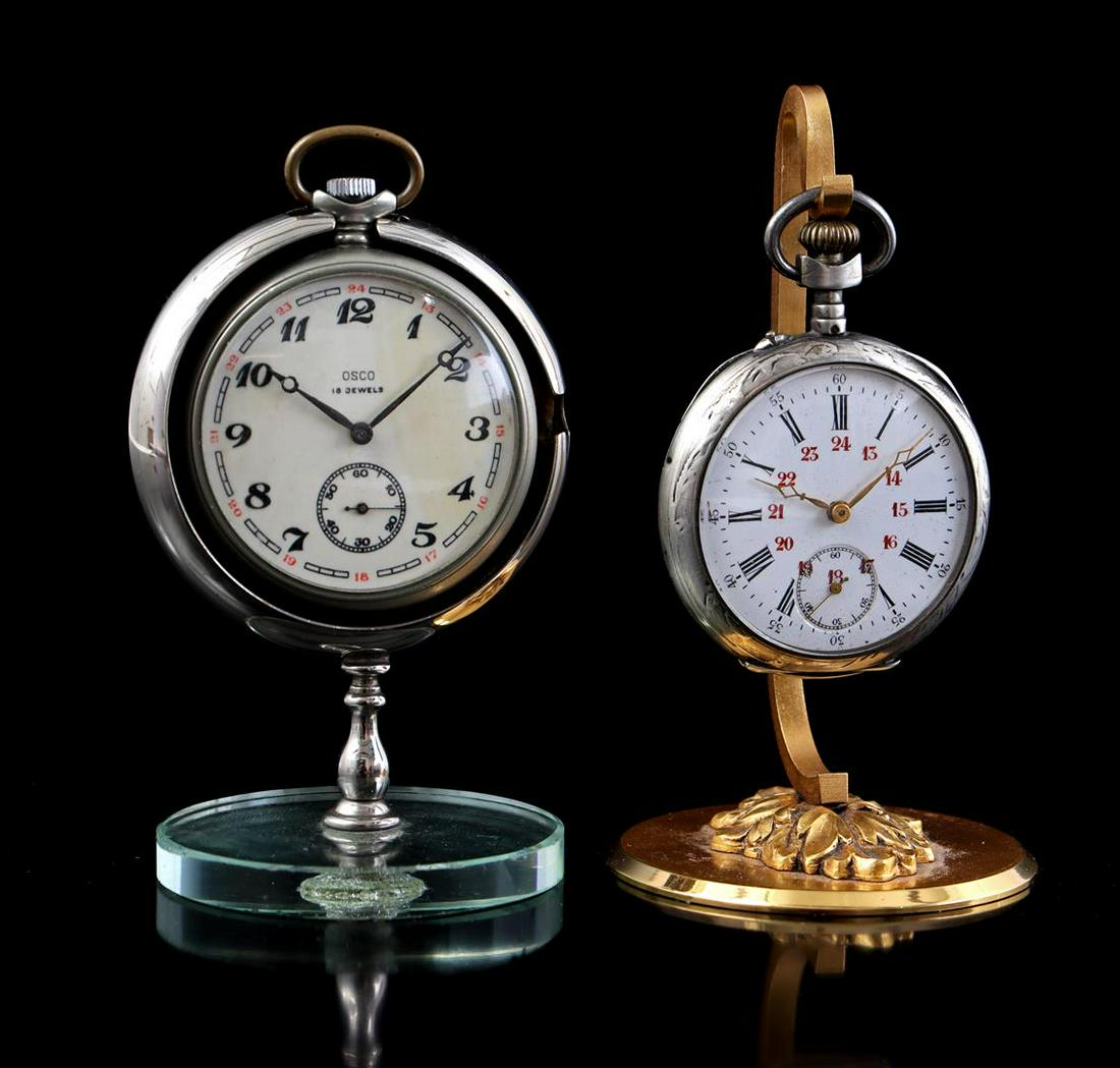 2 old vest pocket watches on holder (1 of 1)