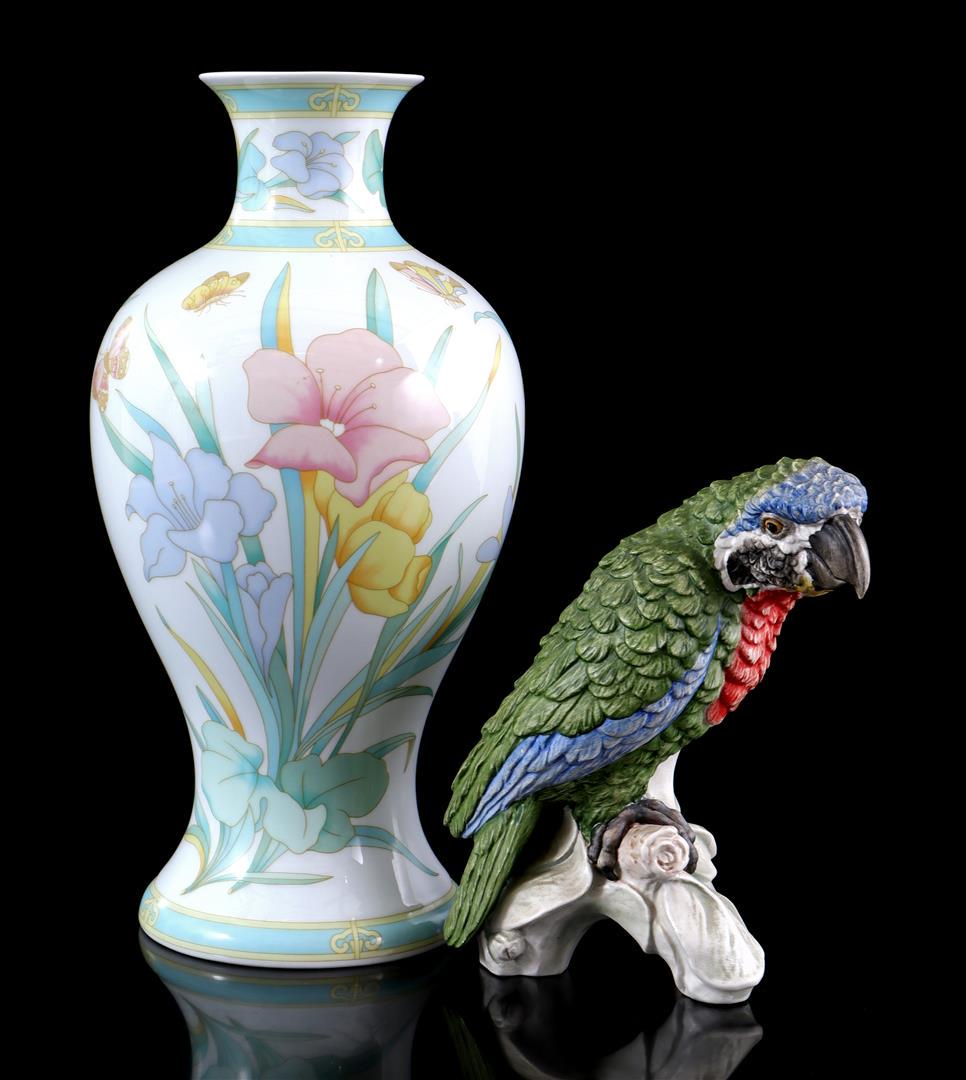 Hutschenreuther porcelain vase: Hutschenreuther porcelain vase with floral decor and butterflies 35.5 cm high and Goebel statue of a parrot, 21 cm high
