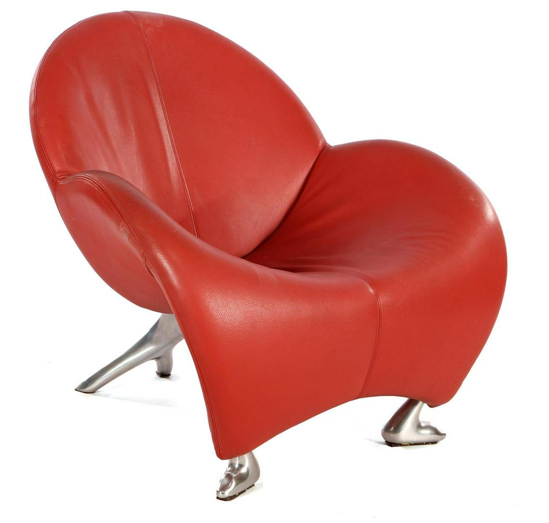 Jan Armgardt (1947-) Organic red leather bucket seat: Jan Armgardt (1947-)Organic red leather bucket seat on chromed aluminum 3-leg, design Jan Armgardt for Leolux, model Papageno, Netherlands design year 1993, possibly later version