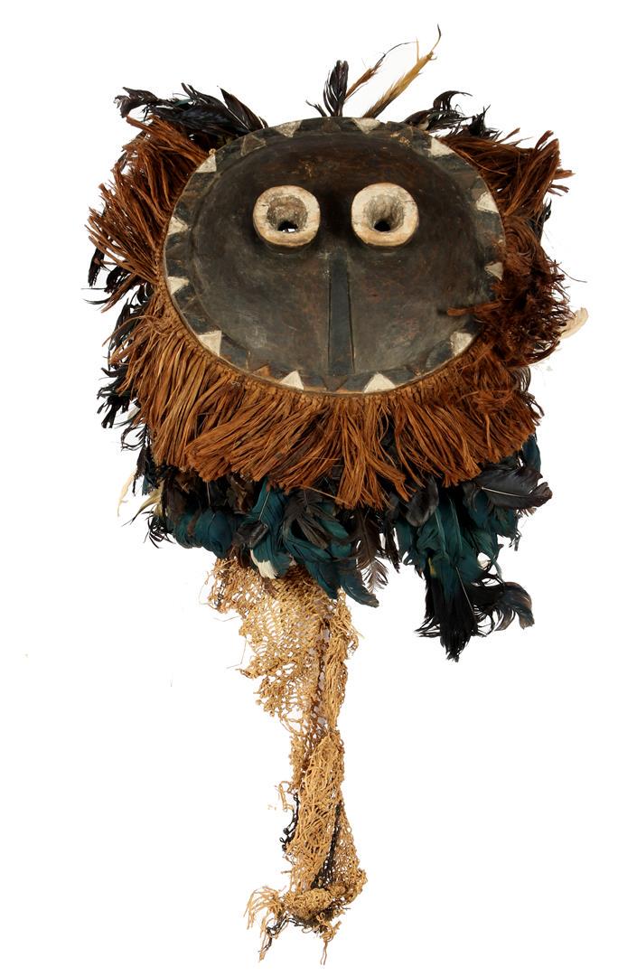 Wooden ceremonial mask with flax: Wooden ceremonial mask with flax and feathers, Pende, Africa ca. 1940, wooden mask is 35x39 cm