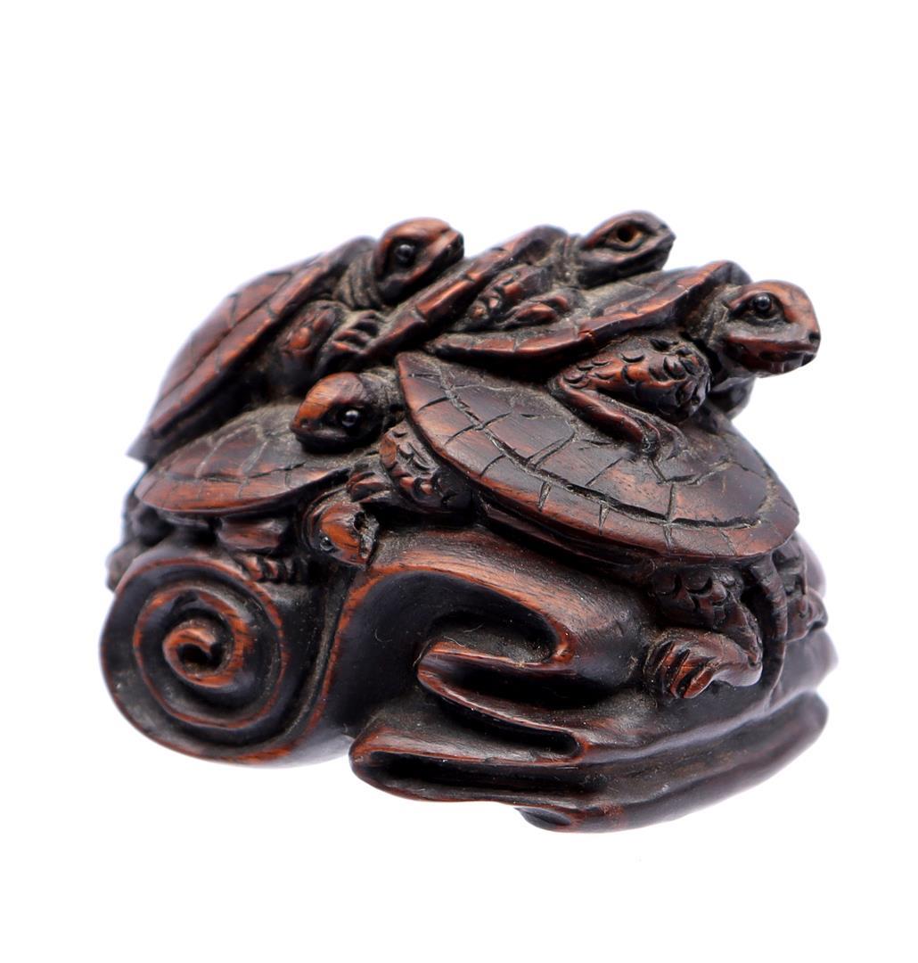 Japanese boxwood netsuke of turtles: Japanese boxwood netsuke of turtles on a rock, Japan Meiji Period ca. 1900, 4 cm wide