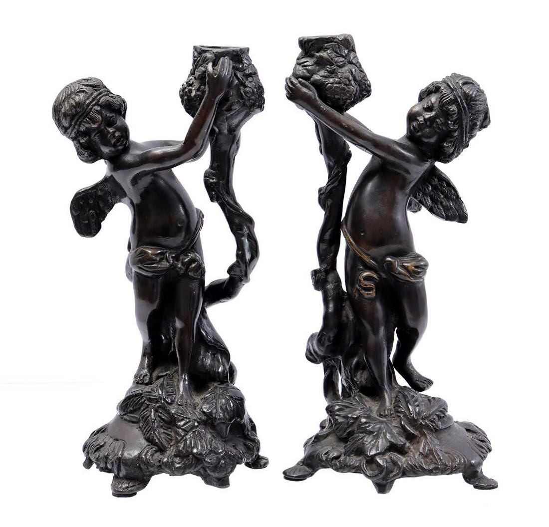 1 pair of bronze putti candlesticks (1 of 1)