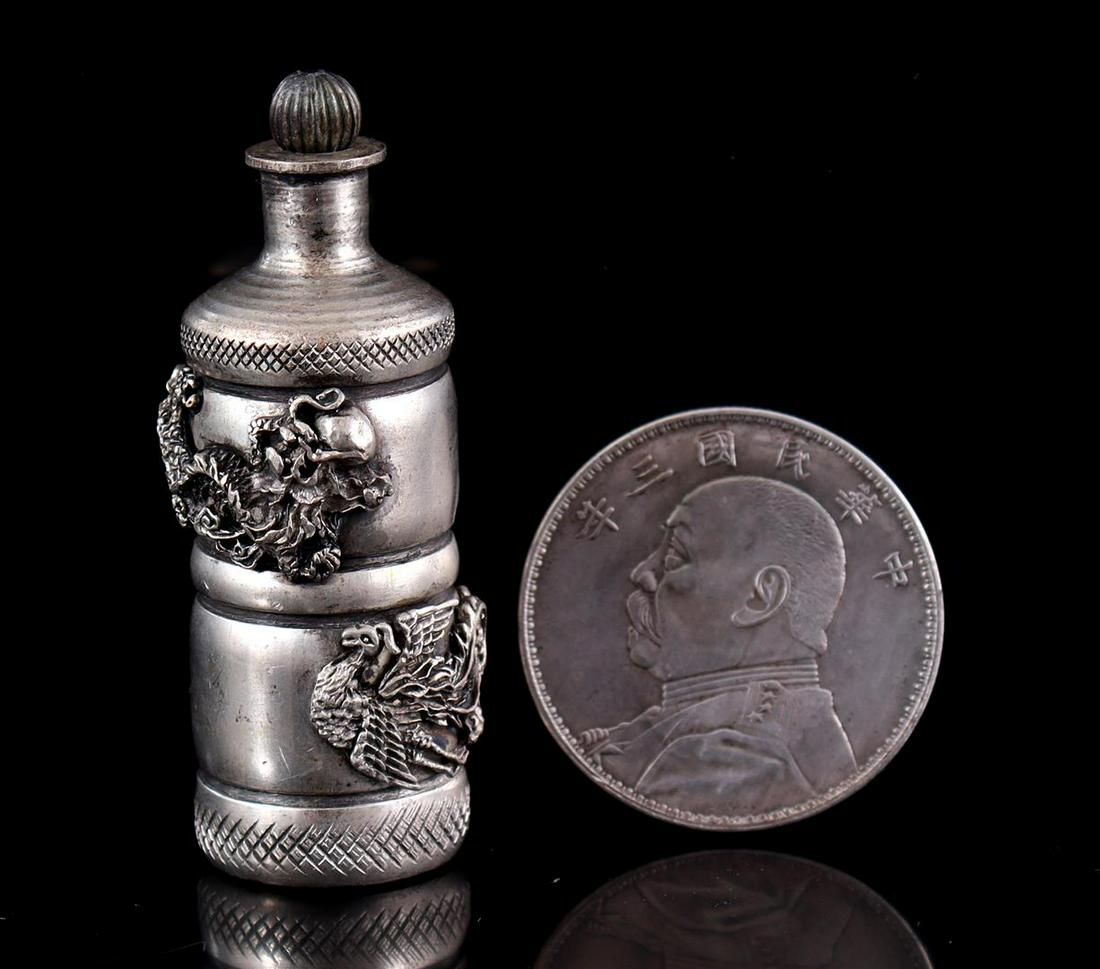 Silver coin and silver plated snuf bottle (1 of 3)