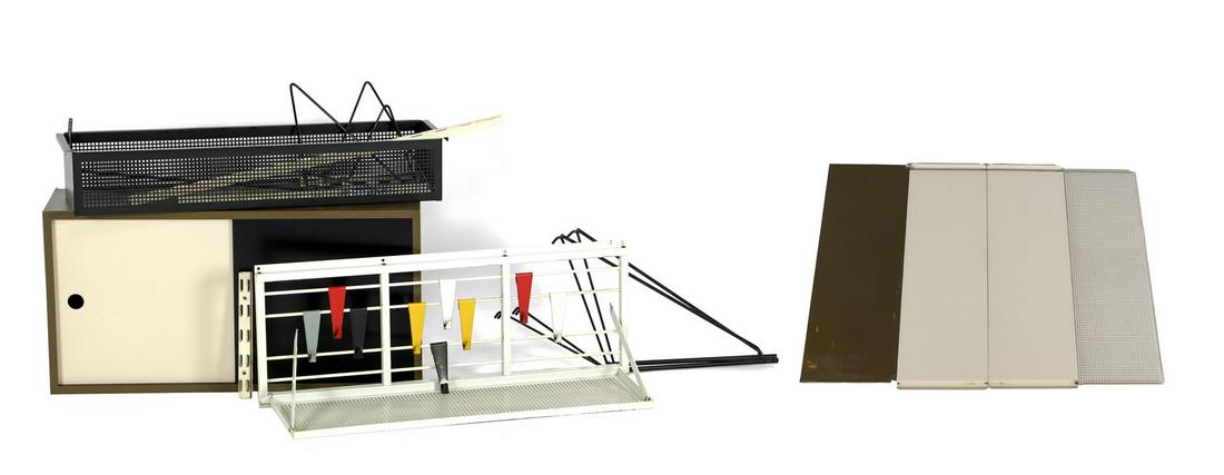 Tjerk Reijenga: Tjerk ReijengaMetal wall system b.u. sliding door wardrobe, wall coat rack (not in detail photo), perforated box and shelf, 3 shelves and 6 wall slats, design Tjerk Reijenga for Pilastro, Netherlands