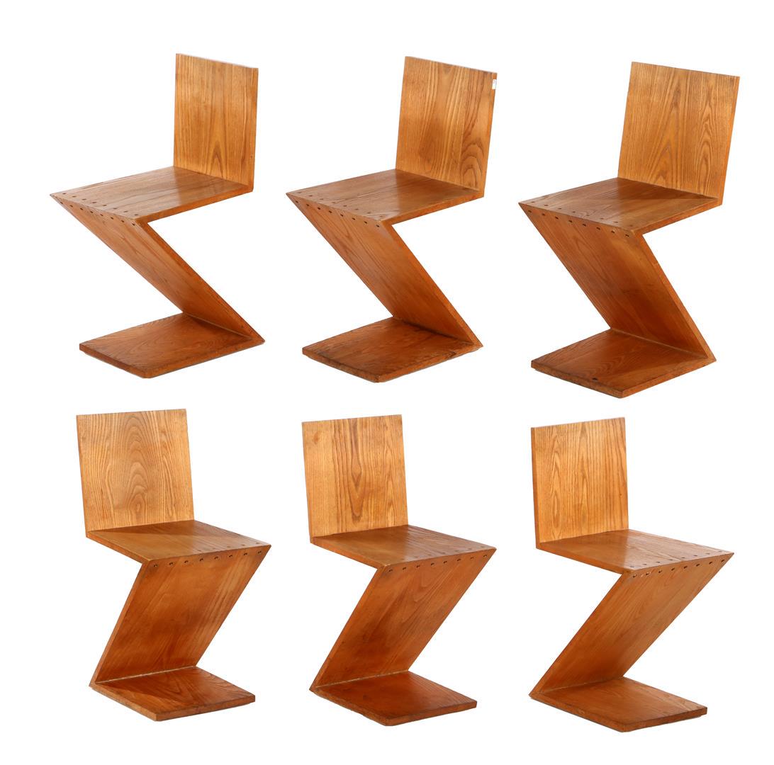 6 oak chairs: 6 oak chairs, inspired by the Zig-Zag chair design by Gerrit Rietveld, backrest is 76.5 cm high. Origin studio Klaas Gubbels