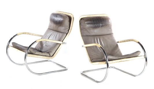 2 tubular frame armchairs: 2 chromed tubular frame armchairs with wicker and leather cushions, in the style of Anton Lorenz for Tecta