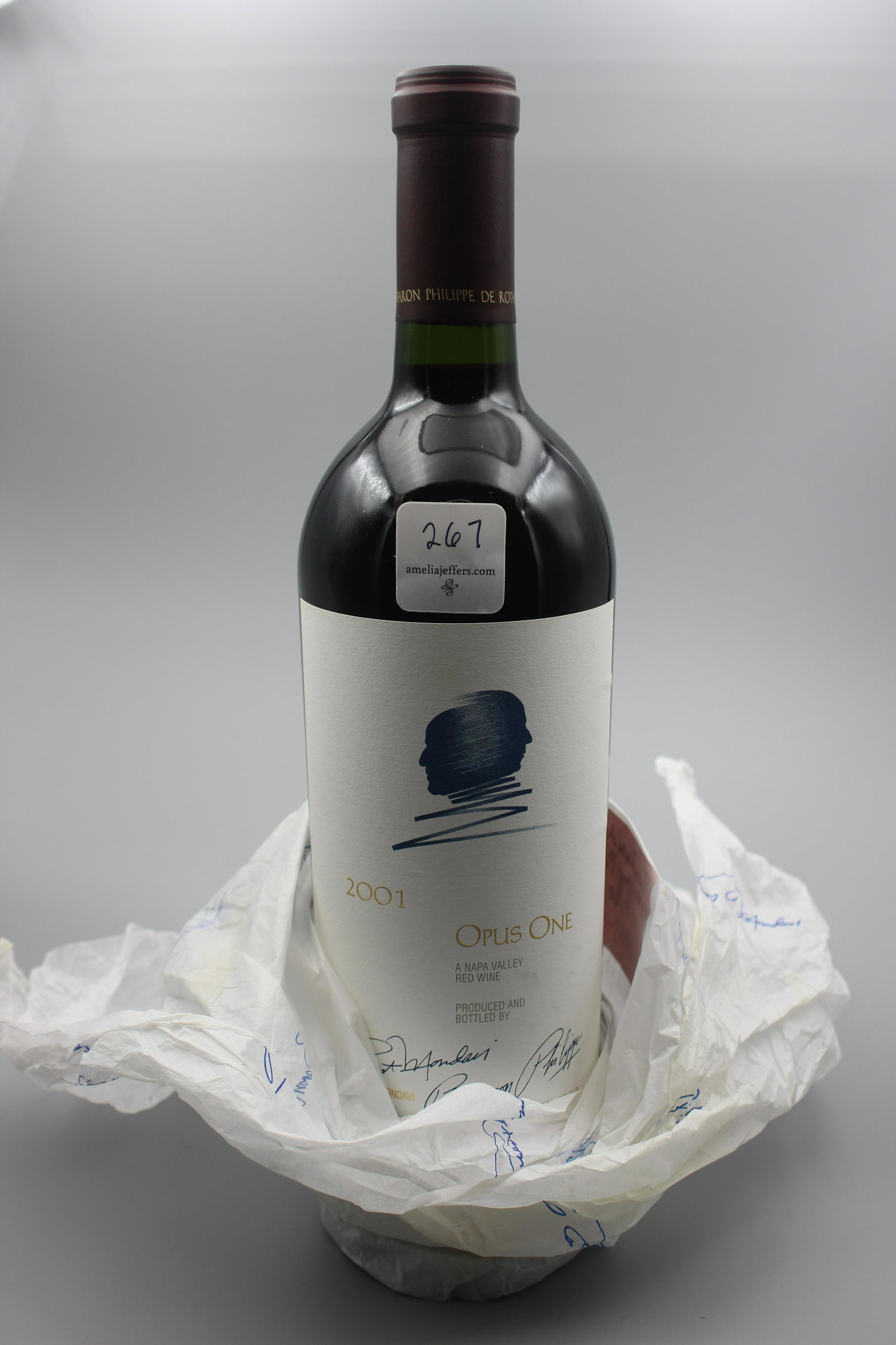 2001 RED TABLE WINE (OPUS ONE).: Napa Valley, California. Robert Mondavi and Baron Philippe de Rothschild. In original paper. (750ml) Sold on behalf of the Estate of Sharron M. Capen, Delaware County, Ohio, Probate Court, Case #21010