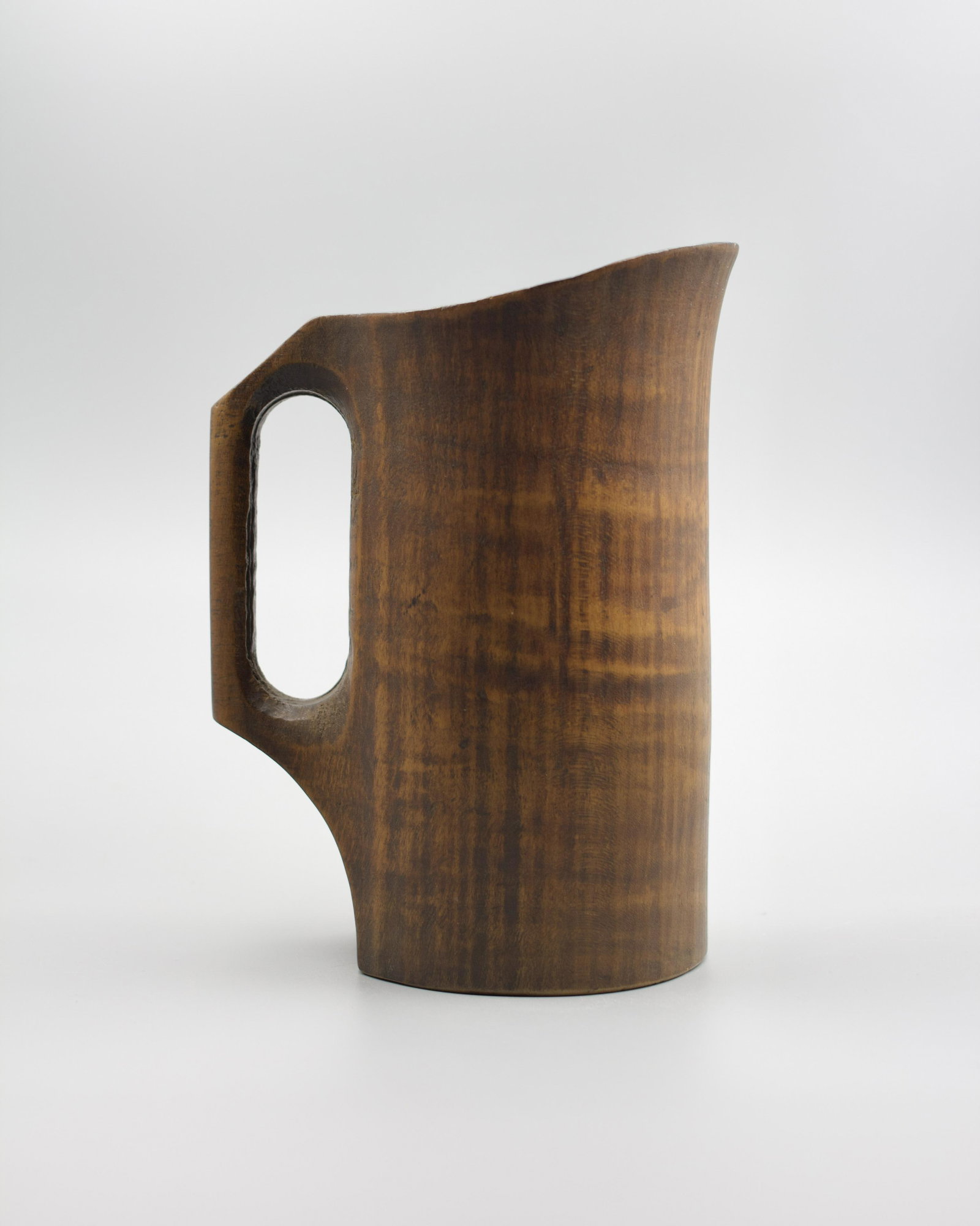 EARLY FIGURED HAND-CARVED WOOD TREEN NOGGIN (MUG).: American, 18th Century. Probably a cider mug, retaining very good patina and beautifully figured. 6.5"h.