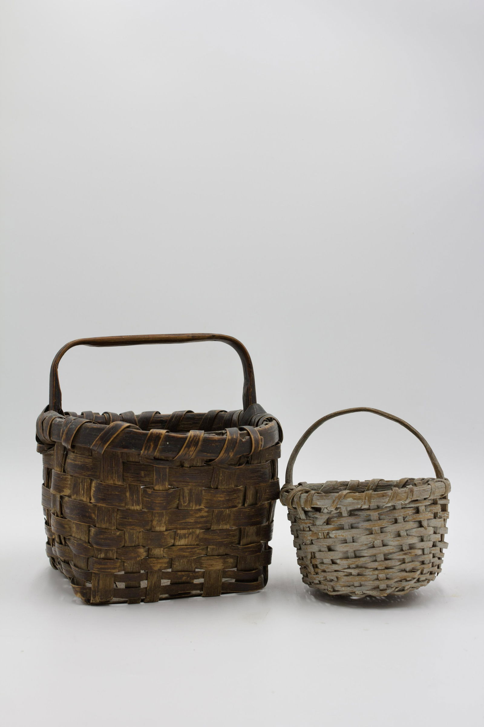 TWO PAINTED BASKETS. (1 of 5)
