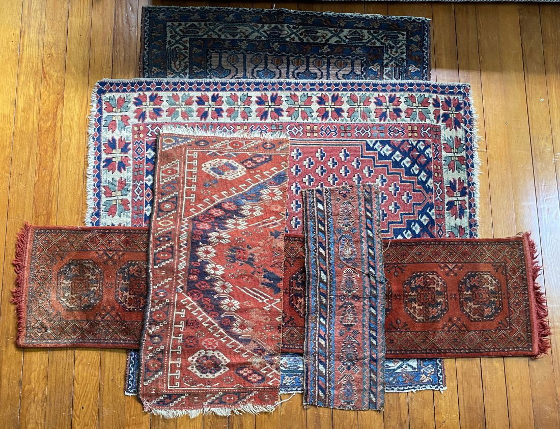 TWO ORIENTAL RUGS PLUS RUG FRAGMENTS. (1 of 1)
