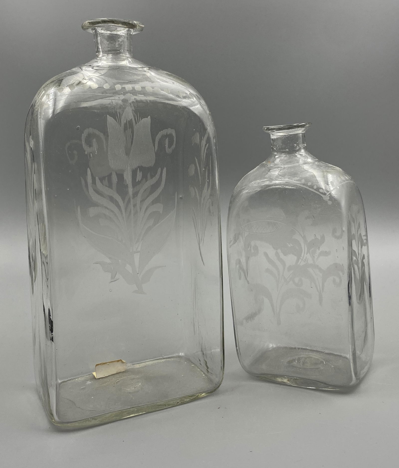 TWO STEIGEL TYPE BOTTLES. (1 of 2)