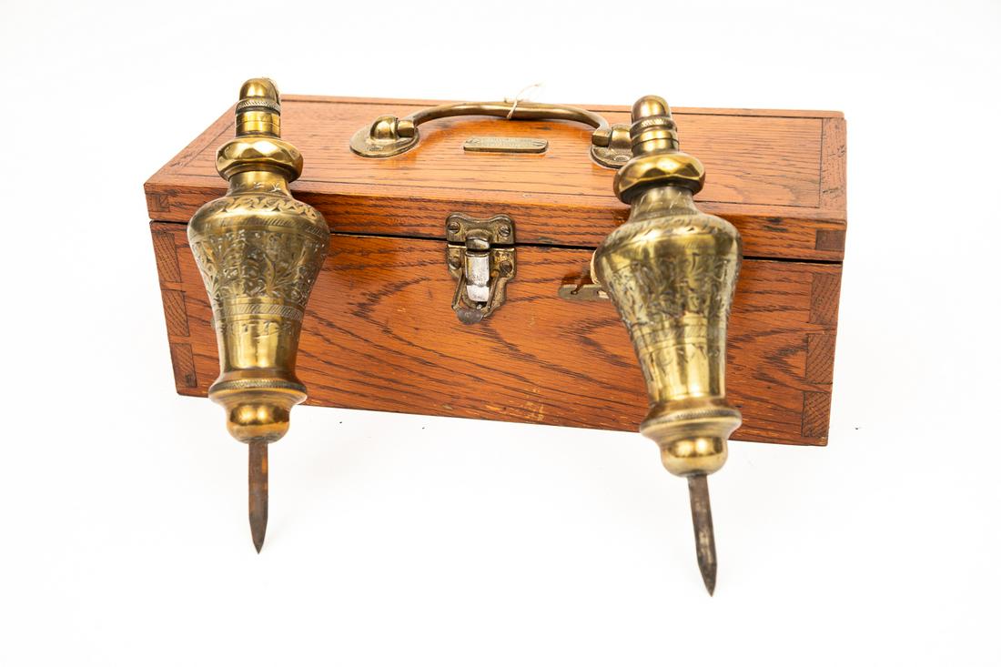 ENGINEERS PLUMBLINES WITH CASE.: English, c. 1850. Etched metal plum bobs in wood case with brass hardware. Excellent condition. Latch marked "Cheney England". Case 11.25"w x 4"h x 5"d.