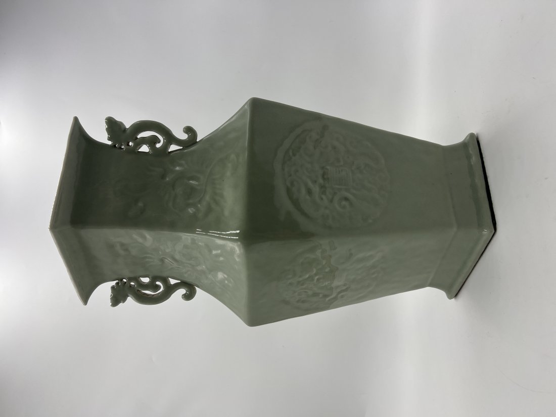 CELADON LAMP BASE.: China, 20th Century. Celadon porcelain lamp base with scroll handles. Stamped to the underside. Excellent condition. 9"w x 14"h x 7"d.