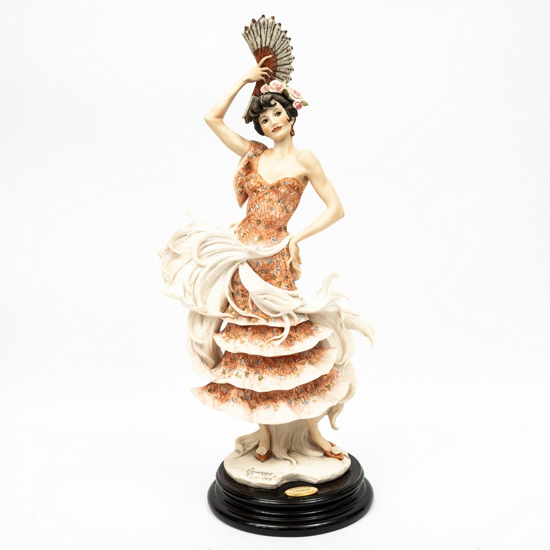 "CARMEN" PORCELAIN FIGURINE BY GIUSSEPPE ARMANI (1993-2006).: Italy, 2000. Capodimonte porcelain figurine titled "Carmen" by Giuseppe Armani for Florence Scultur D'Art. Limted edition 180/5000. Signed in the mold and marked with the blue crown capodimonte mark. 