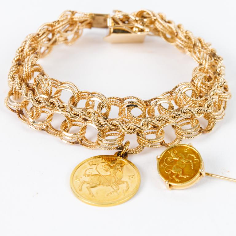 GROUP OF JEWELRY.: European, 20th Century. Group includes a gold chain bracelet, marked "14KT", a charm marked "18KT" and a stick pin, unmarked. Bracelet 8" long, .5" wide. 41.74 grams total weight.