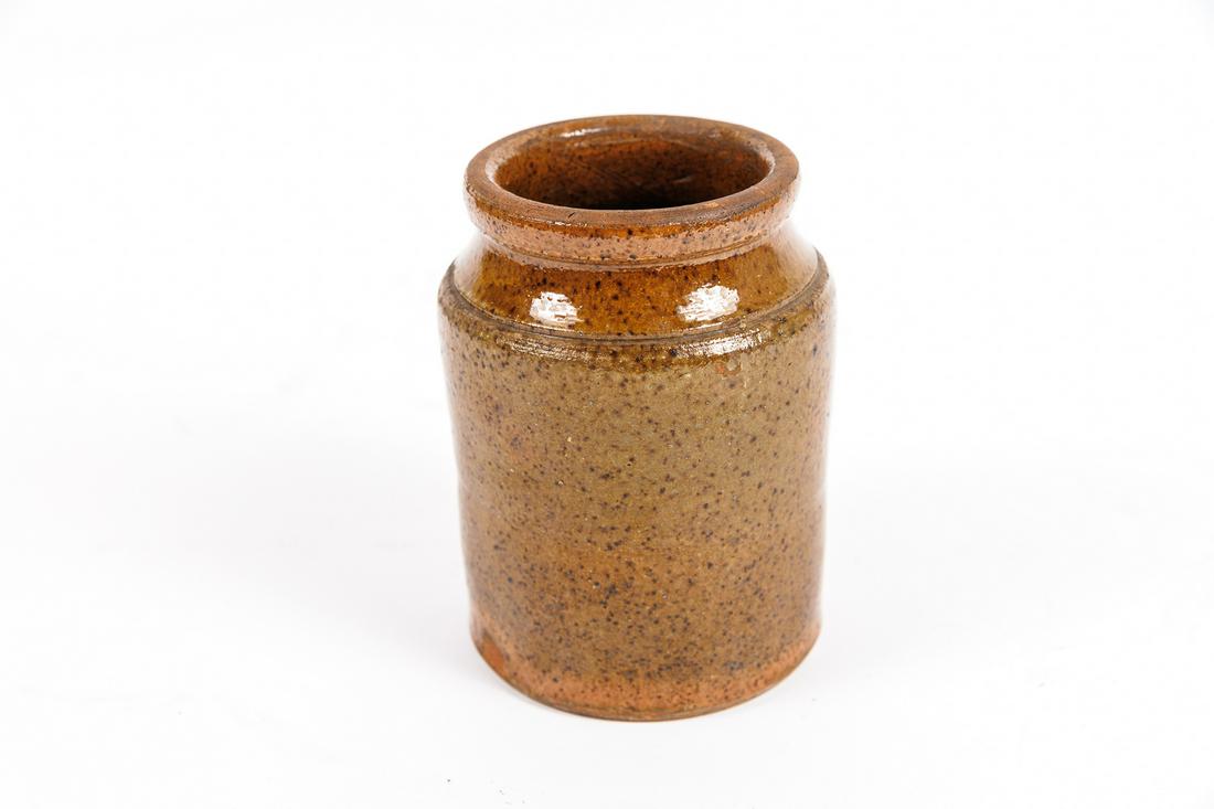 RED WARE JAR.: American (Maine), 19th Century. Small decorated red ware jar 5 1/4"h.