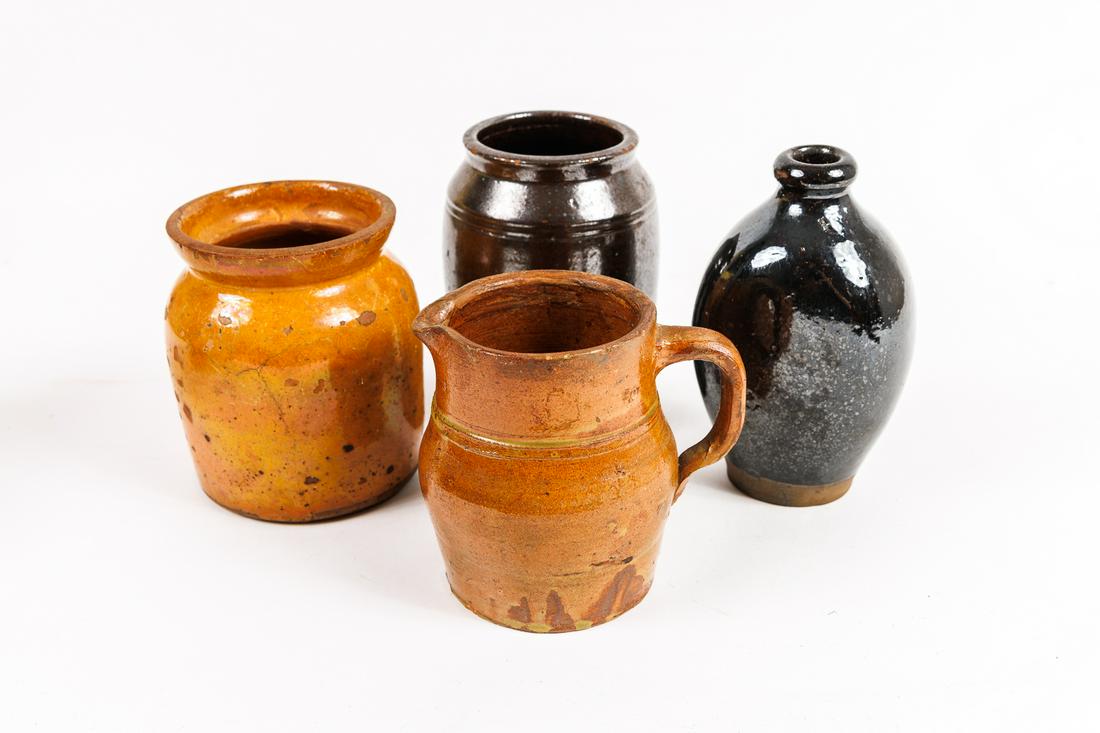 GROUP OF RED WARE.: Ameican, first half 19th Century. Four piece lot including two jars, creamer, & flask expected wear 5" - 6.5"h.