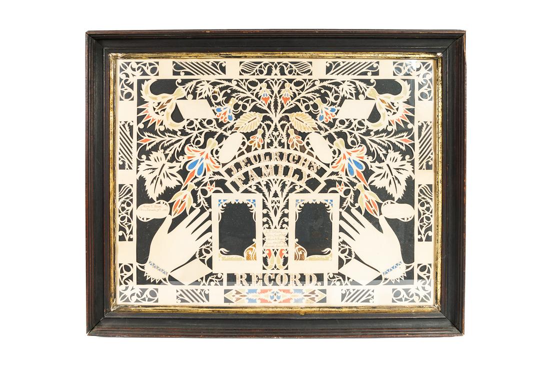 SCHERENSCHNITTE FAMILY RECORD IN FRAME BY JOHN BROWN (J.B.) WALKER (1815 - 1908).: American (Ohio), 19th Century. Cut paper and ink. Exuberant design for "J.F. Ulrich's Family Record", recording the births of J.F. Ulrich (June 9th, 1869), Minnie M. Wenger (April 27th 1869), and Muri