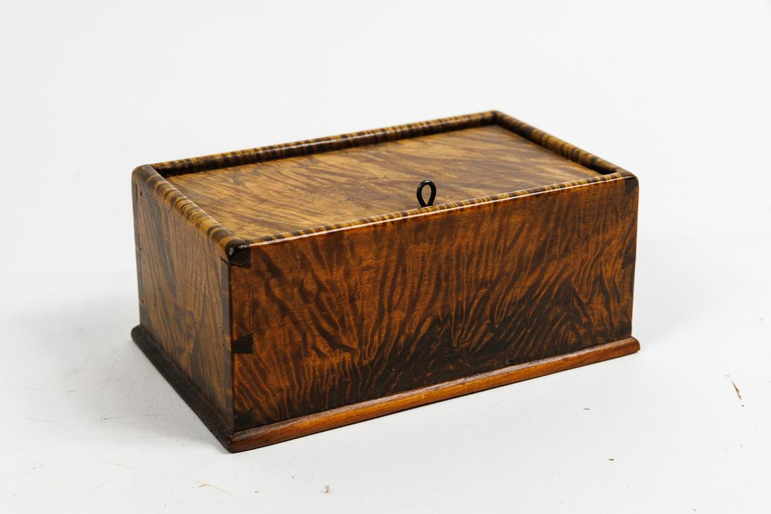 SMALL DOVETAILED TIGER MAPLE LIFT LID BOX BY BERNIE HARTER.: American, 20th Century. 6"l. 2.5"h.