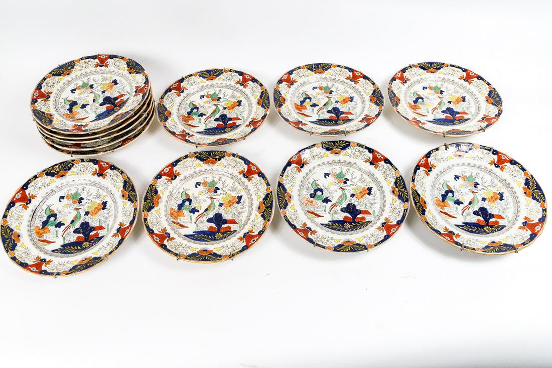 GROUP OF 12 PLATES: England, 20th Century. Set of 12 Mason's ironstone plates with pheasants and chinoiserie. Includes plate hangers, some chips and staining. 9.75"d.