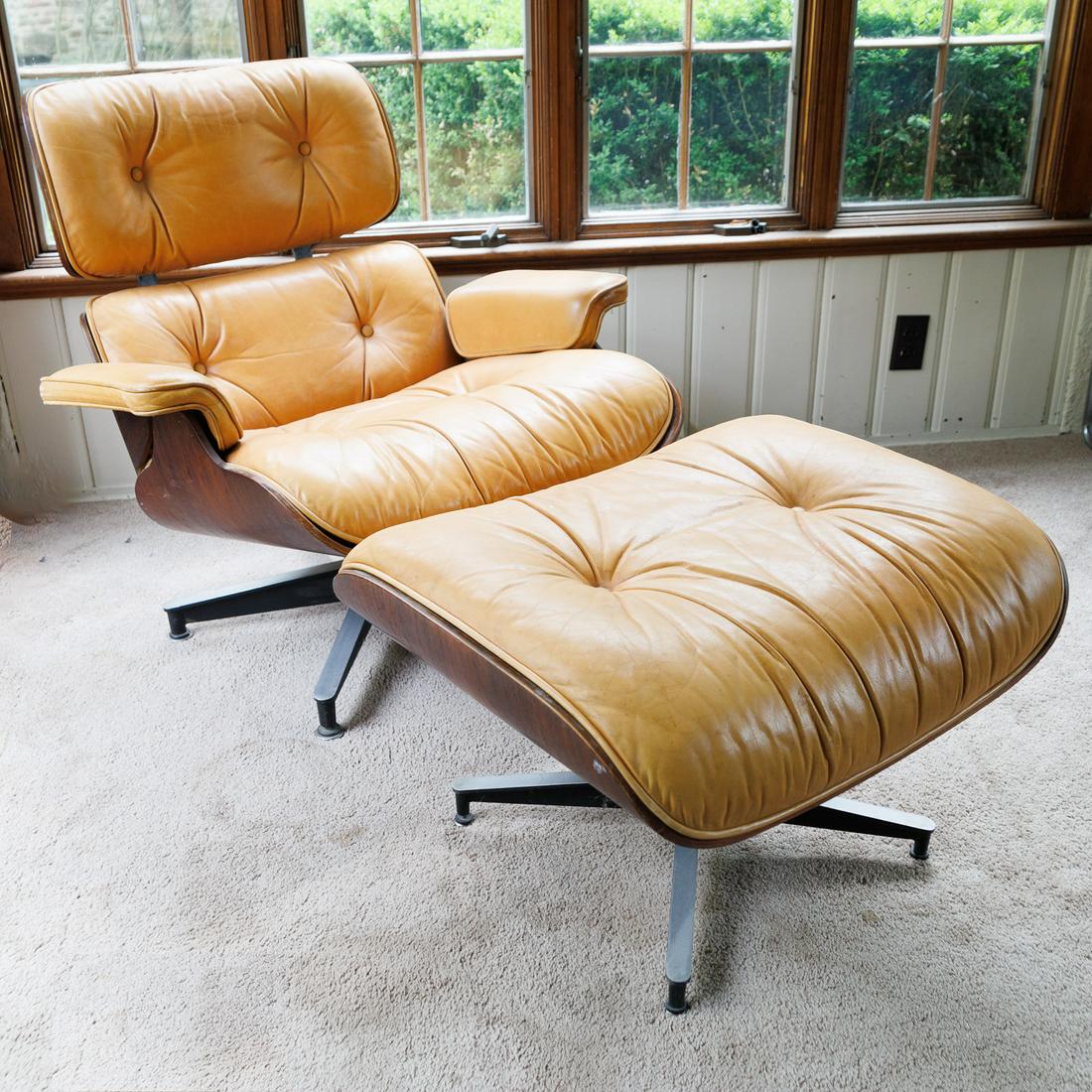 LEATHER AND WOOD SWIVEL LOUNGE CHAIR AND OTTOMAN BY CHARLES AND RAY EAMES FOR HERMAN MILLER.: American, 20th Century (circa 1960-1970). Model 670 and 671, version 2. Rosewood frames with tan leather. With tags. Chair, 32"h. 32.5"w. 31"d. Ottoman, 18"h. 25.75"w. 22"d. Leather is marked, and nee