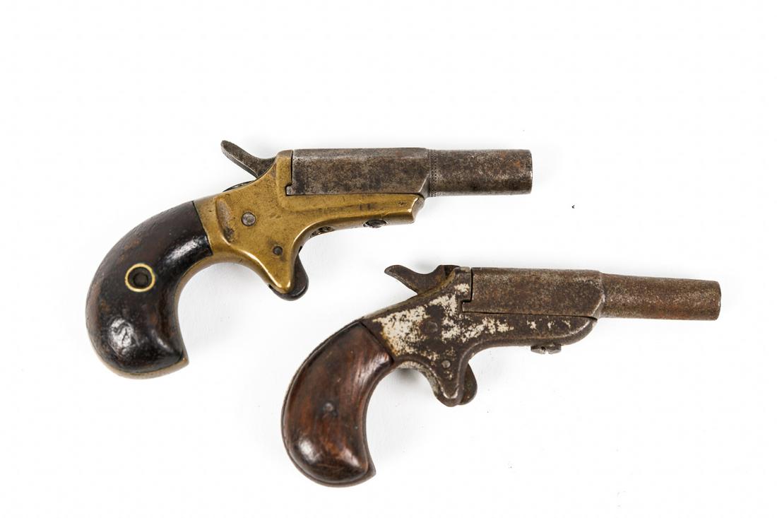 TWO MINIATURE SINGLE-ACTION "PALM" PISTOLS.: American, 19th Century. .22 caliber. Both need minor repairs.