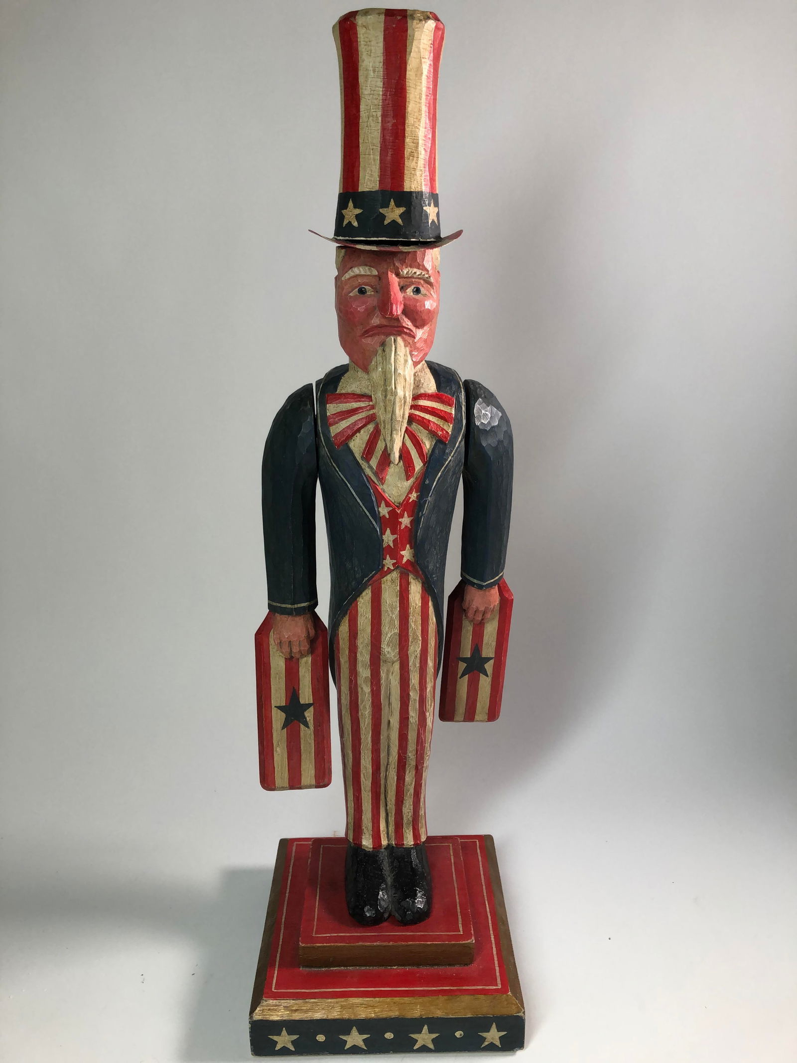 FOLK ART CARVED AND PAINTED U.S.A.-THEMED FIGURINE BY BRAD SCHIFFERL. (1 of 4)