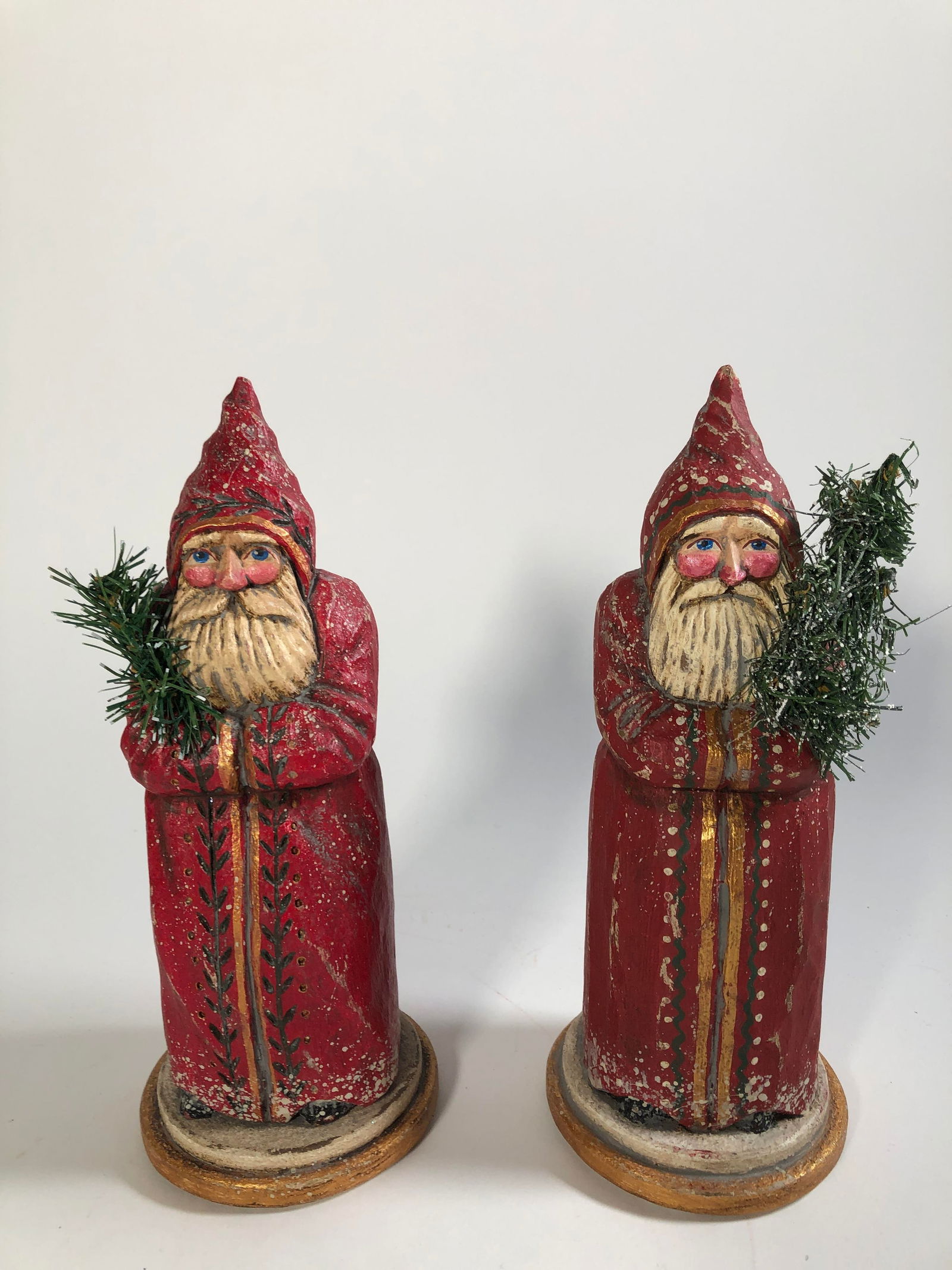 PAIR OF CARVED AND PAINTED CHRISTMAS-THEMED FOLK ART FIGURES BY P. SCHIFFERL. (1 of 4)