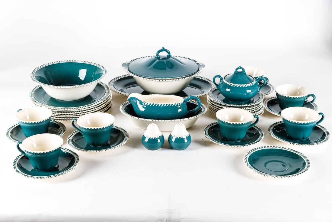 GROUP OF DINNERWARE AND SERVEWARE BY HARKER POTTERY.: GROUP OF DINNERWARE AND SERVEWARE BY HARKER POTTERY. American (East Liverpool, Ohio), 20th Century. Including 16 saucers, salt & pepper shakers, two serving bowls, seven dinner plates, one covered ser