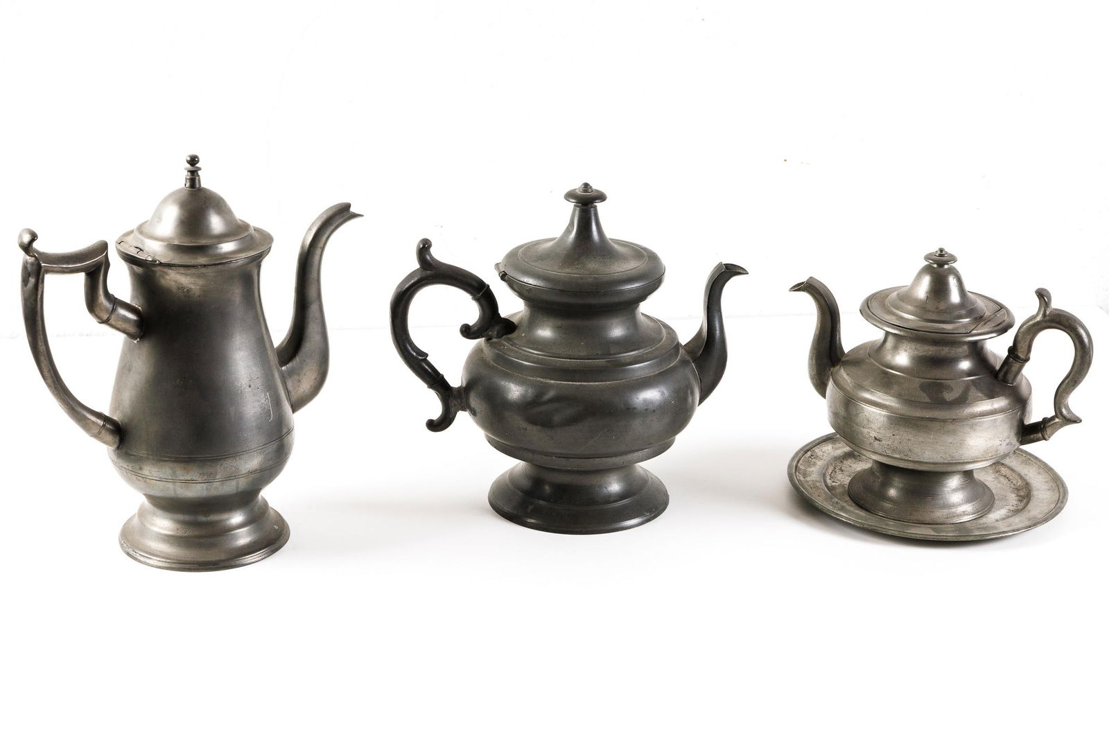 FOUR PIECES OF PEWTER. (1 of 15)