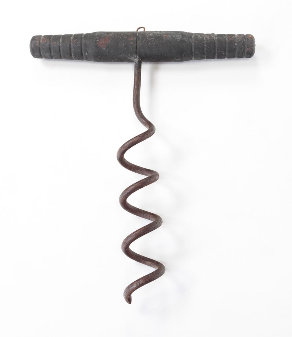 FRENCH CORKSCREW WINE TRADE SIGN.: Late 19th century. Turned wooden handle with wrought iron screw. Layers of black paint on handle with some flaking. 24"h. 19.5"w.