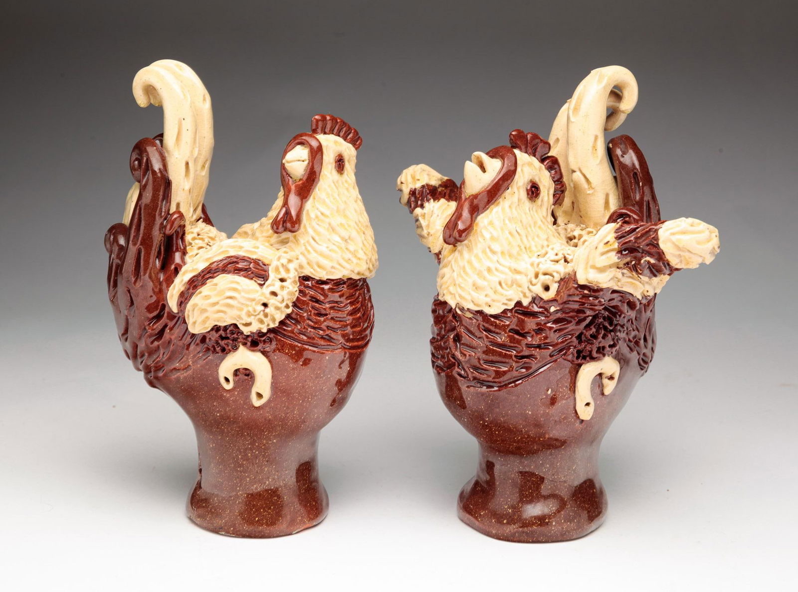 PAIR OF FOLK ART REDWARE POTTERY ROOSTERS BY BILLY RAY HUSSEY (B. 1955). (1 of 5)