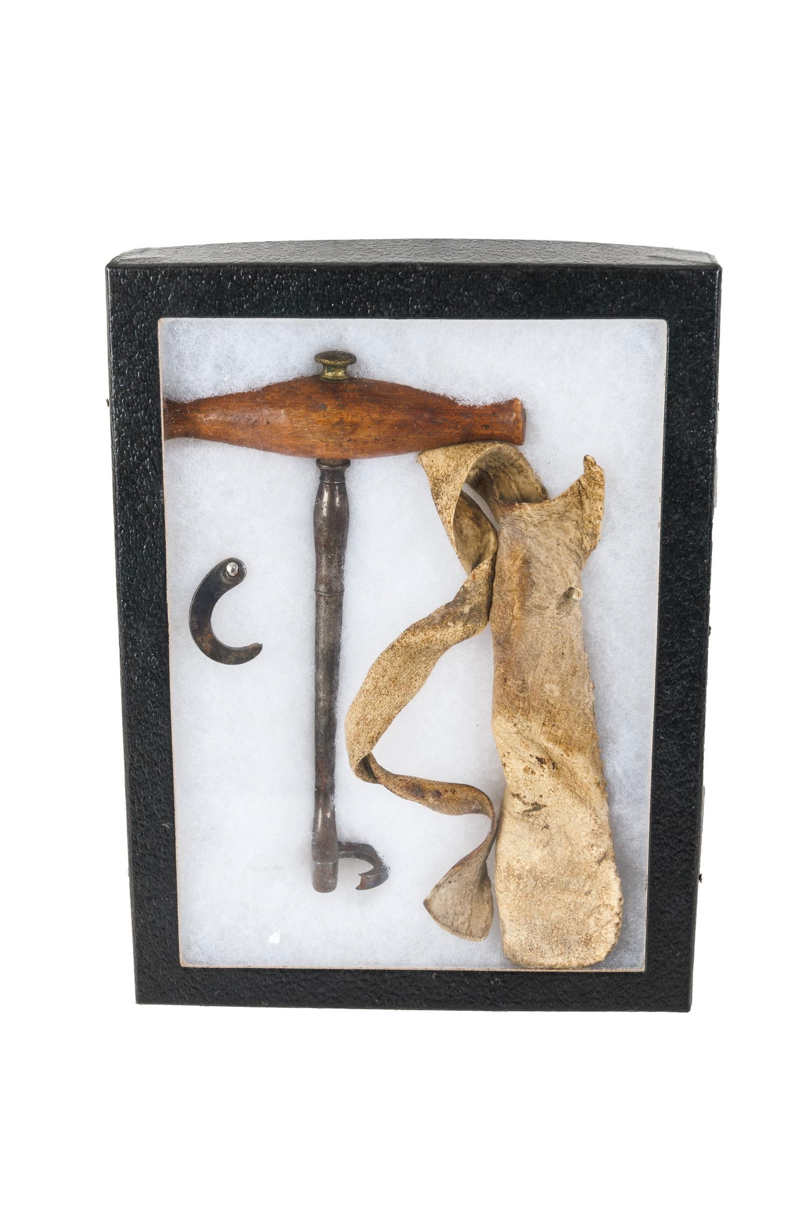 CIVIL WAR ERA DENTAL TOOL.: American, mid-19th Century. Tooth extracting instrument in display box. 6"l.