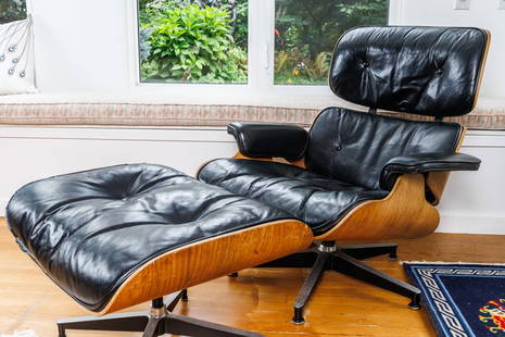 HERMAN MILLER CHAIR AND OTTOMAN BY CHARLES AND RAY EAMES.: American, 20th century. Rosewood, leather, and down. Introduced by Herman Miller in 1956. Second Generation 1960-1971.