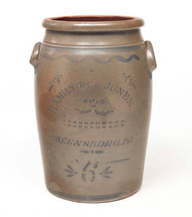 HAND STENCILED AND DECORATED STONEWARE JAR.: American, second half 19th Century. Six gallon jar freehand and stenciled cobalt decoration. Impressed "Hamilton & Jones Greensboro, PA". 17.25"h. 12"d.