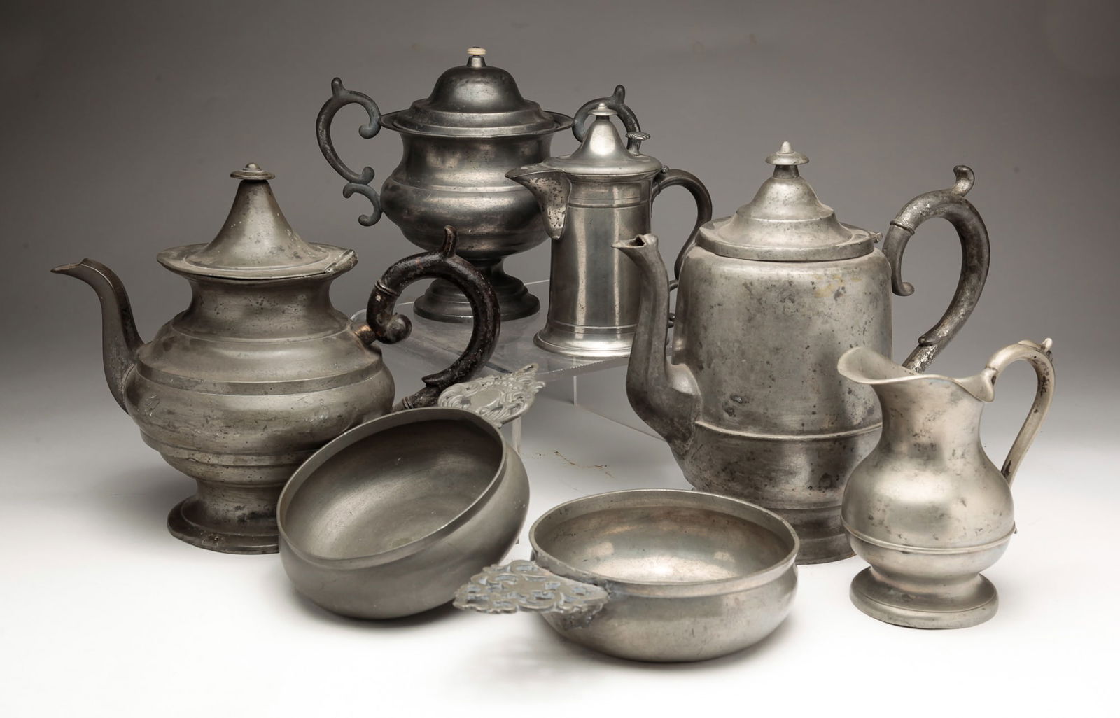 SEVEN PIECES OF UNMARKED PEWTER. (1 of 4)