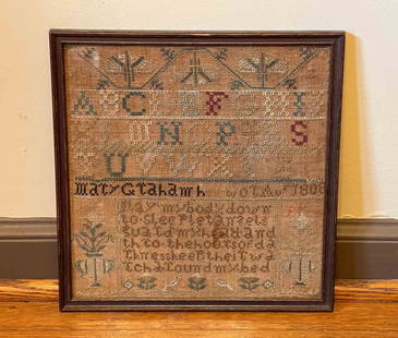 SAMPLER BY MARY G. TAHAMB.: English, first quarter 19th Century. Linen with wool thread. Dated 1808. Alphabet and verse with floral border. Discoloration and fading. 11.5"h. 11.25"w.