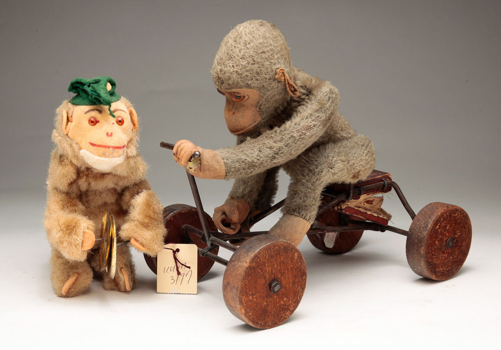 TWO MONKEY TOYS. (1 of 4)