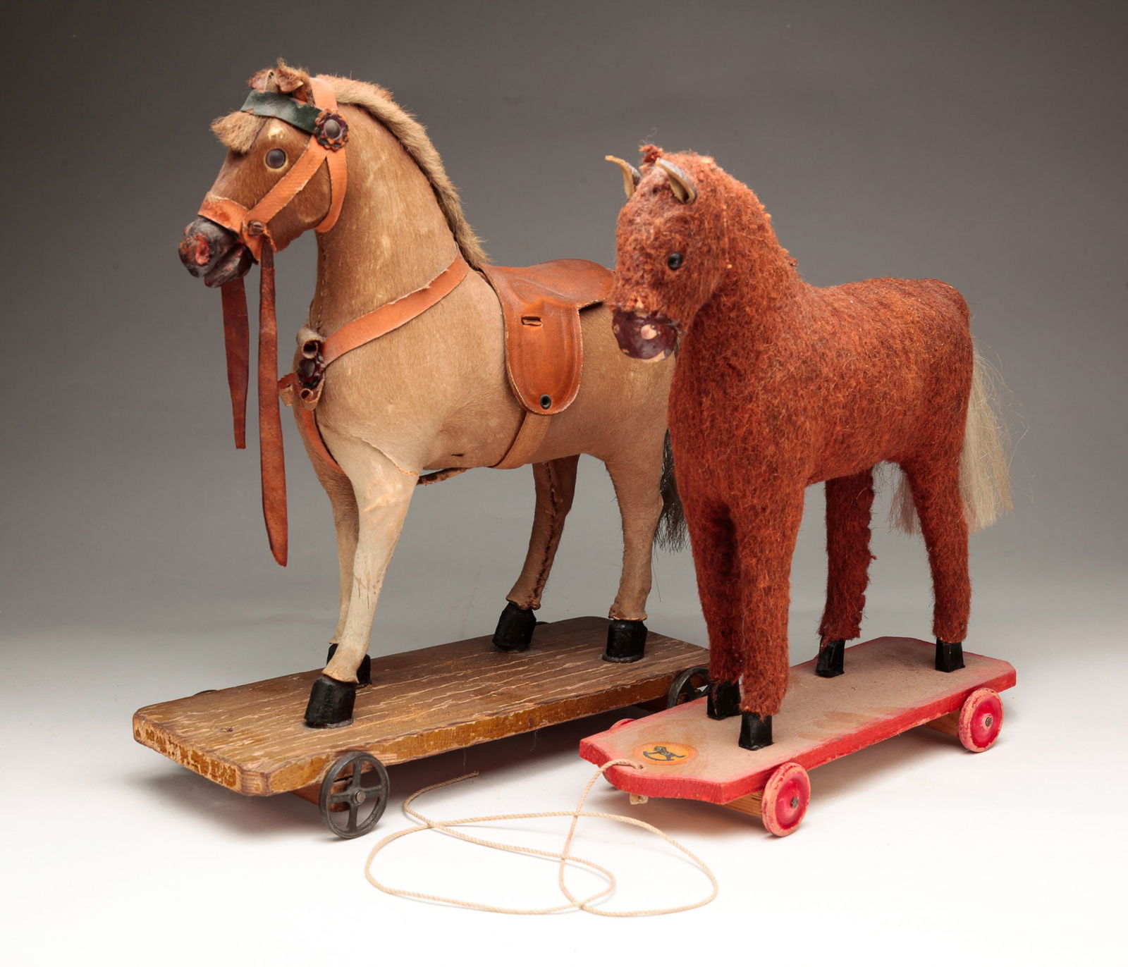TWO HORSE PULL TOYS. (1 of 4)