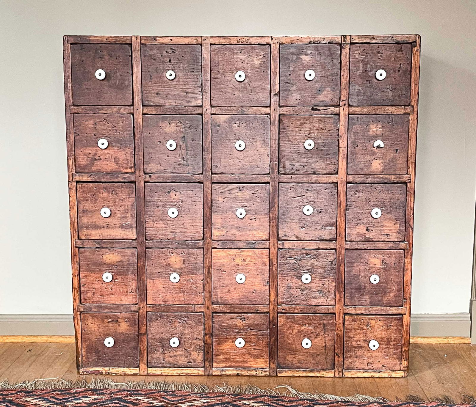 TWENTY-FIVE DRAWER APOTHECARY CABINET. (1 of 3)
