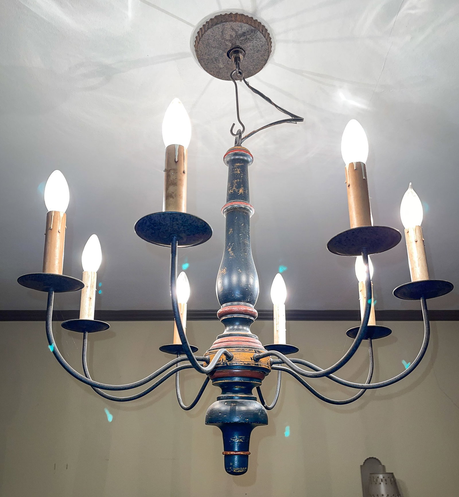 18th CENTURY STYLE CHANDELIER.: American, late 20th Century. Turned center post with blue, yellow, and red distressed paint, shaped iron arms and saucer shaped bobeche. 34"h.