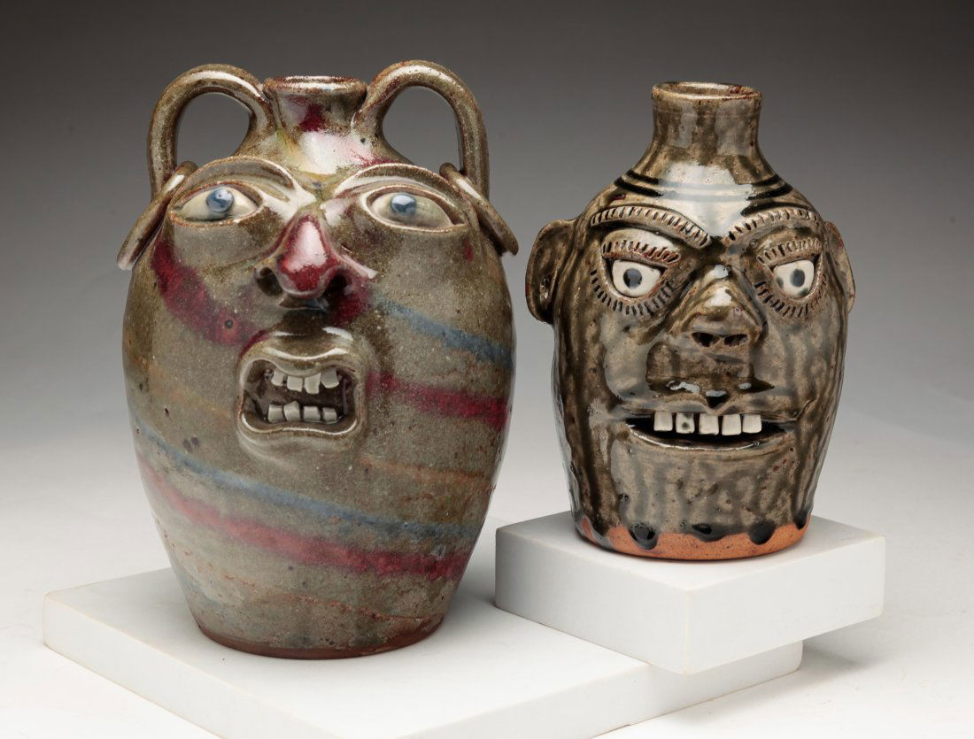 TWO GROTESQUE FACE JUGS. (1 of 8)