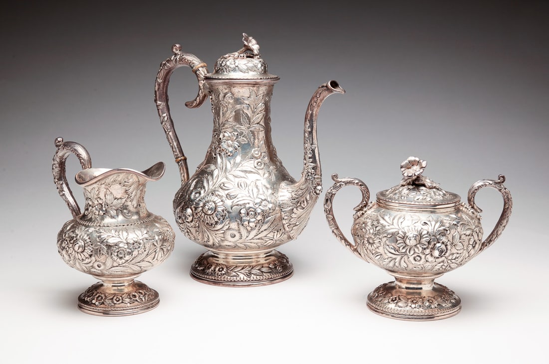 THREE PIECE KIRK REPOUSSE STERLING TEA SET. (1 of 8)
