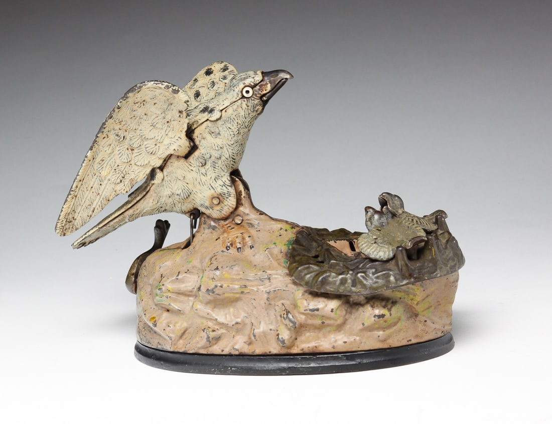 AMERICAN EAGLE AND EAGLETS MECHANICAL BANK. (1 of 7)