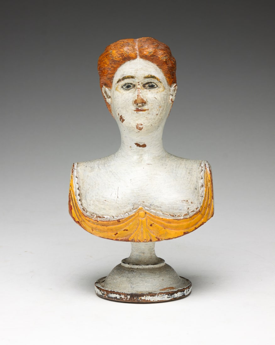CARVED BUST OF A WOMAN. (1 of 5)