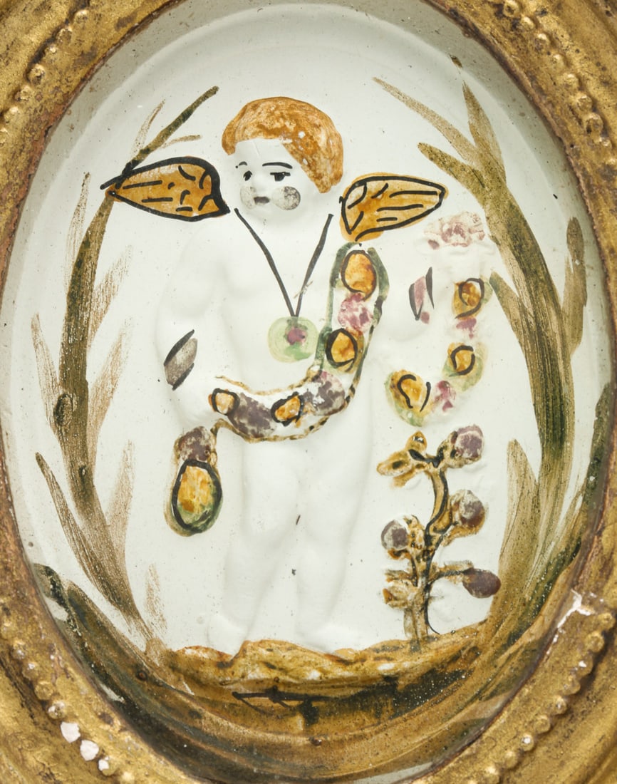 ENGLISH VICTORIAN CHALKWARE WALL PLAQUE OF CHERUB. (1 of 3)