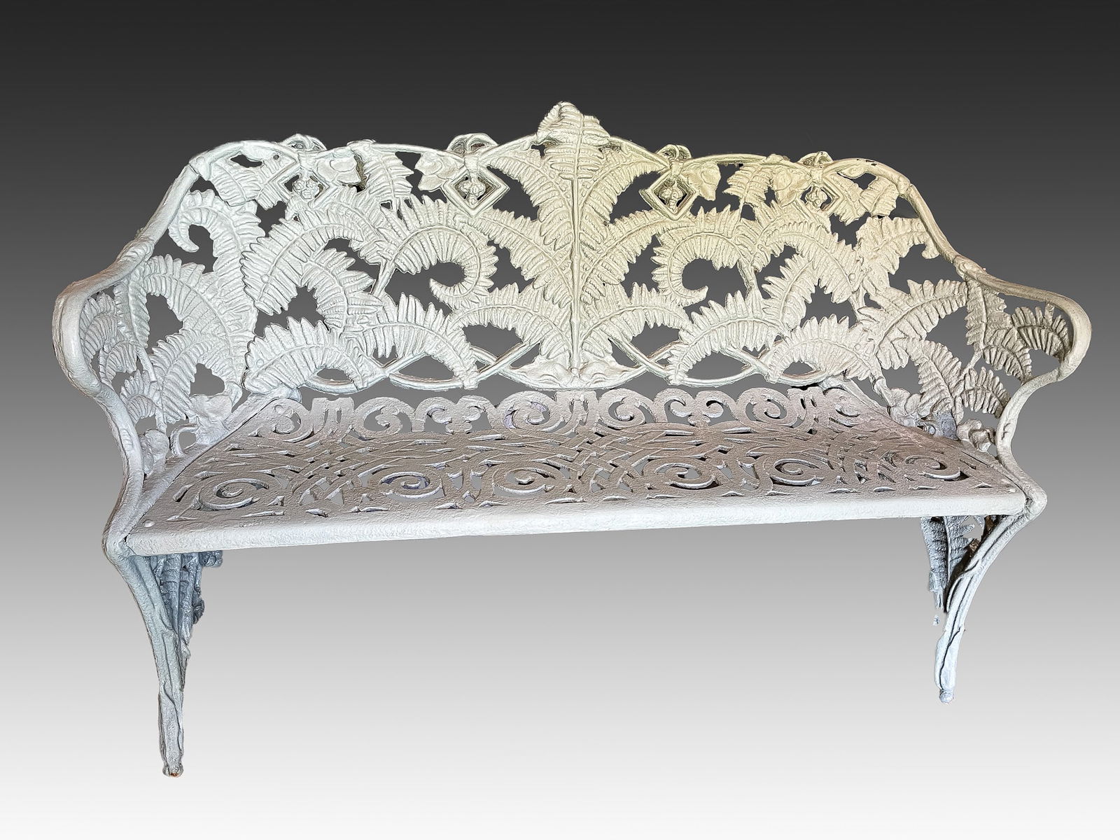 PAIR OF AMERICAN CAST IRON GARDEN BENCHES. (1 of 2)