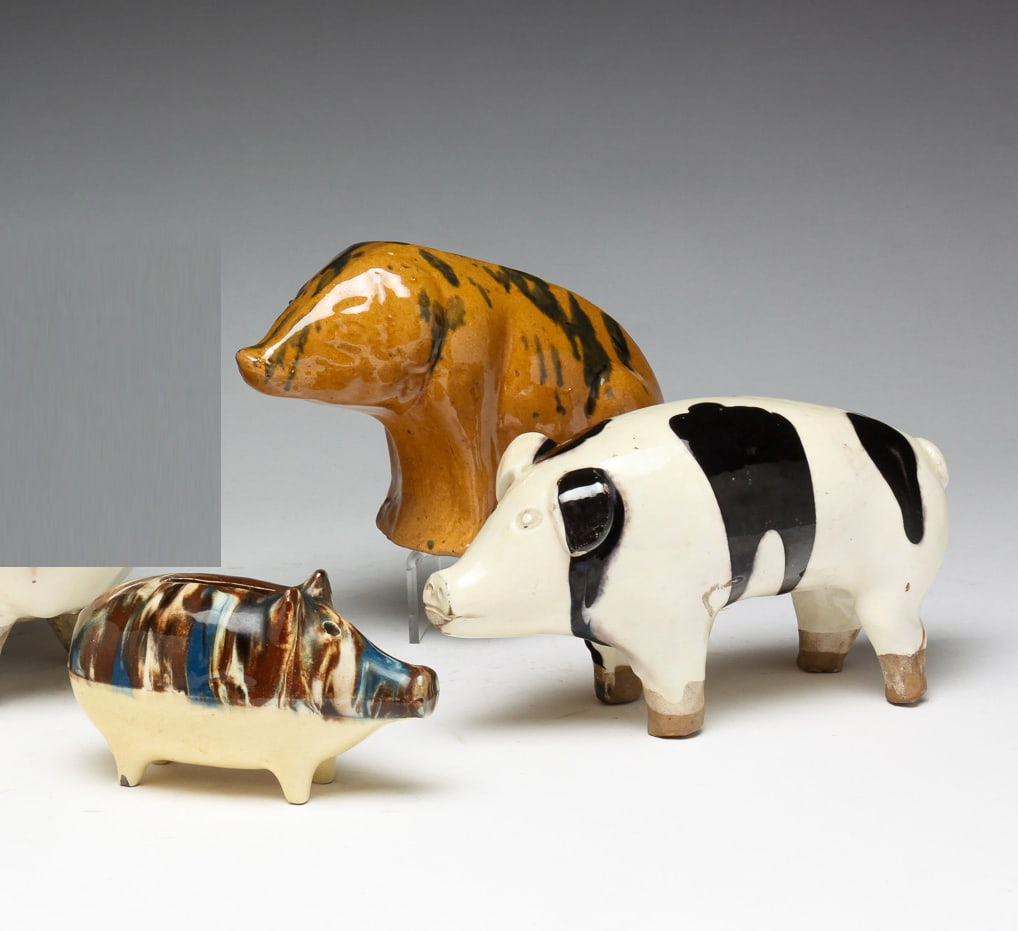 THREE POTTERY PIG BANKS. (1 of 8)